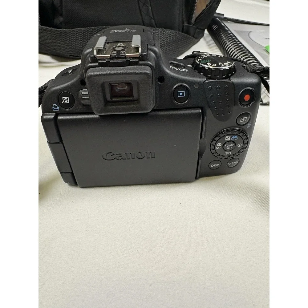 Canon PowerShot SX50 HS 12.1MP Digital Camera Bundle Bag 2-Batteries 32GB SD Kit